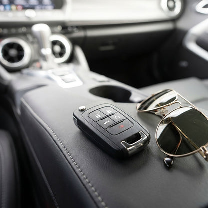 GMC Terrain key fob and sunglasses on center console